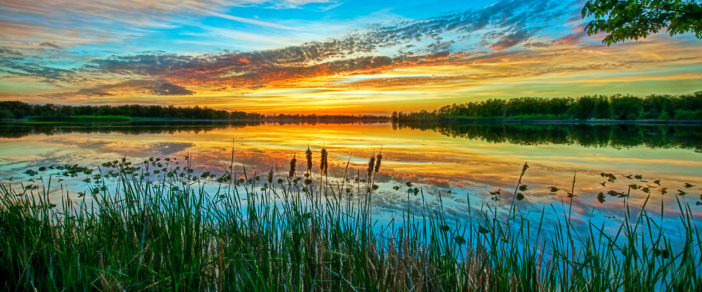 Coastal estuary at colorful sunset
