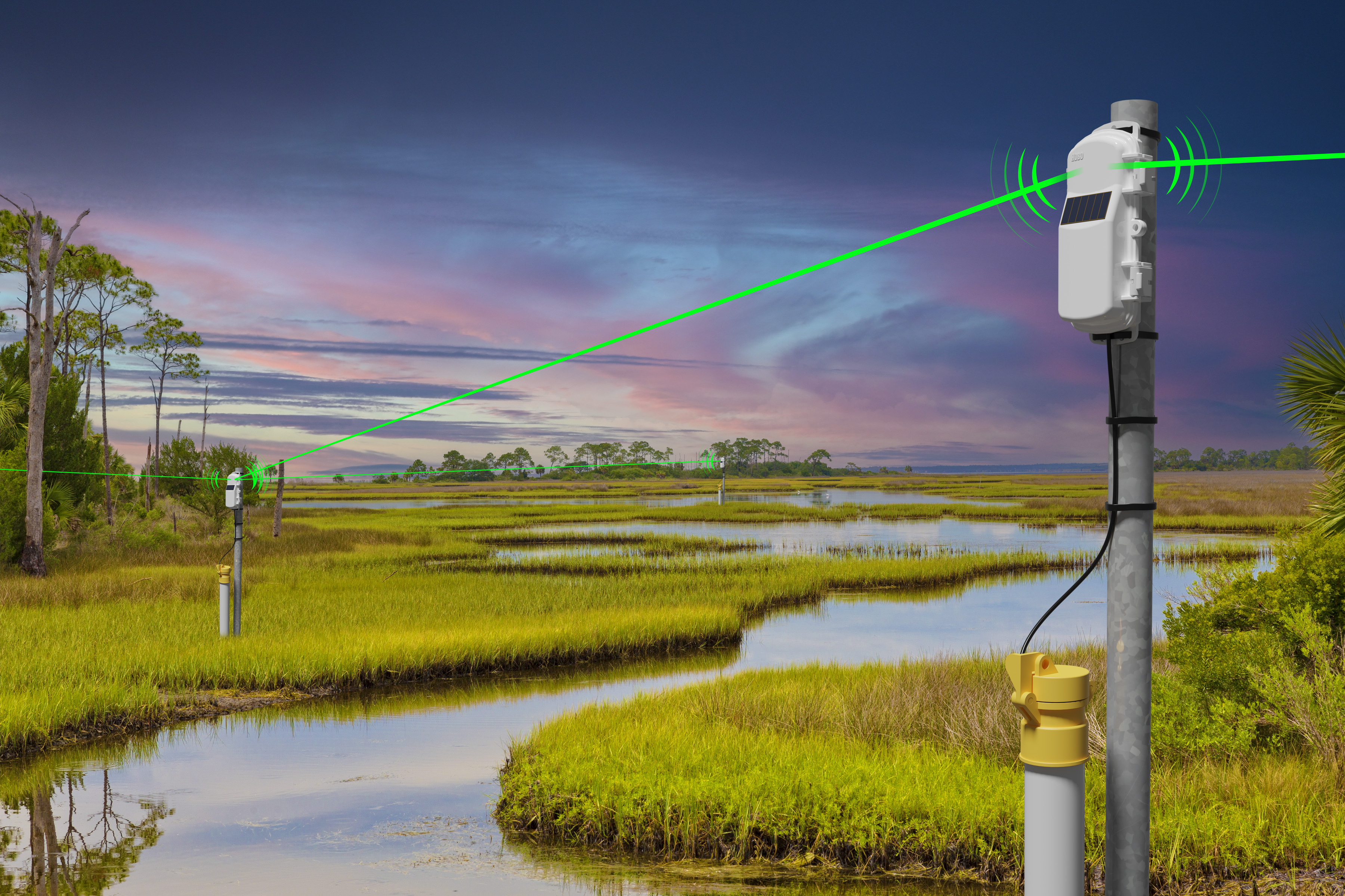 HOBO HOBOnet wireless water level sensor installed beside a monitoring well